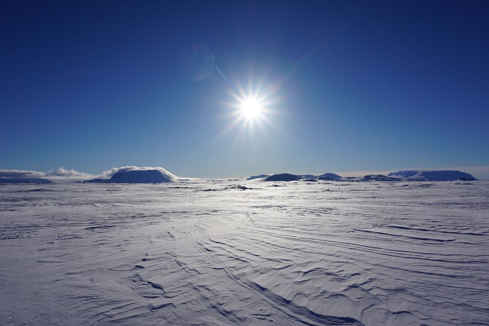 Schneeschuhwandern unter Nordlichtern