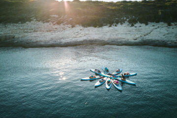 SUP-Yoga in der Bucht